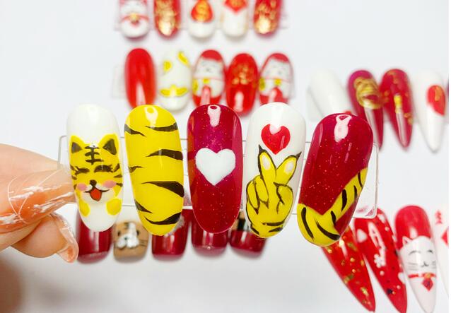 彩繪招財貓美甲，南寧美甲學(xué)?？钍酵扑]